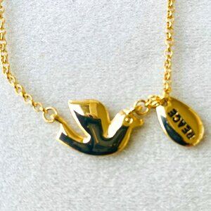 Vintage Cookie Lee gold peace dove necklace